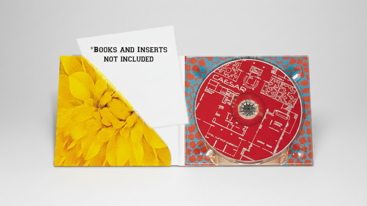  CDs in a 4 panel digipak with a red and yellow design, with a note stating 'books and inserts not included'.